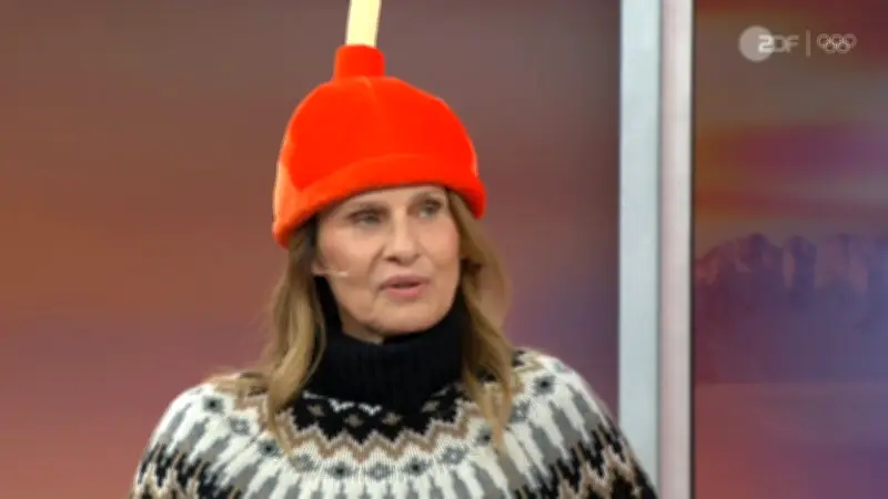 Kurioser Kopfschmuck im ZDF: Müller-Hohenstein trägt Pömpel-Mütze während Olympia-Übertragung