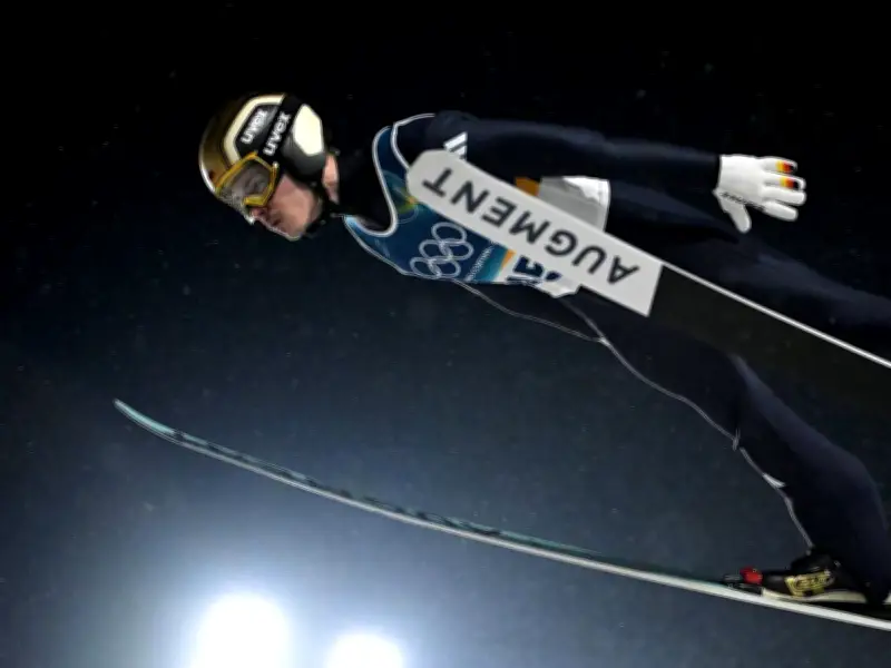 Olympia-Enttäuschung: Philipp Raimund verpasst Podest – Domen Prevc dominiert auf der Großschanze