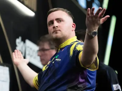 Darts-Weltmeister Littler fordert Olympiasieger Farah zu Halbmarathon-Challenge