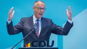Merz zitiert Merkel: „Wir schaffen das“ bei CDU-Parteitag